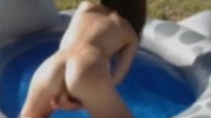 freakish sexy cam girl masturbates in pool like a frog