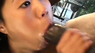 Petite Asian girl can't acquire sufficiently of a big black shut out banging her twat